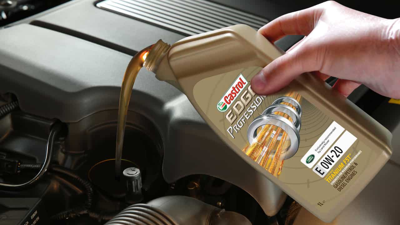 Castrol oil is being poured into the deposit