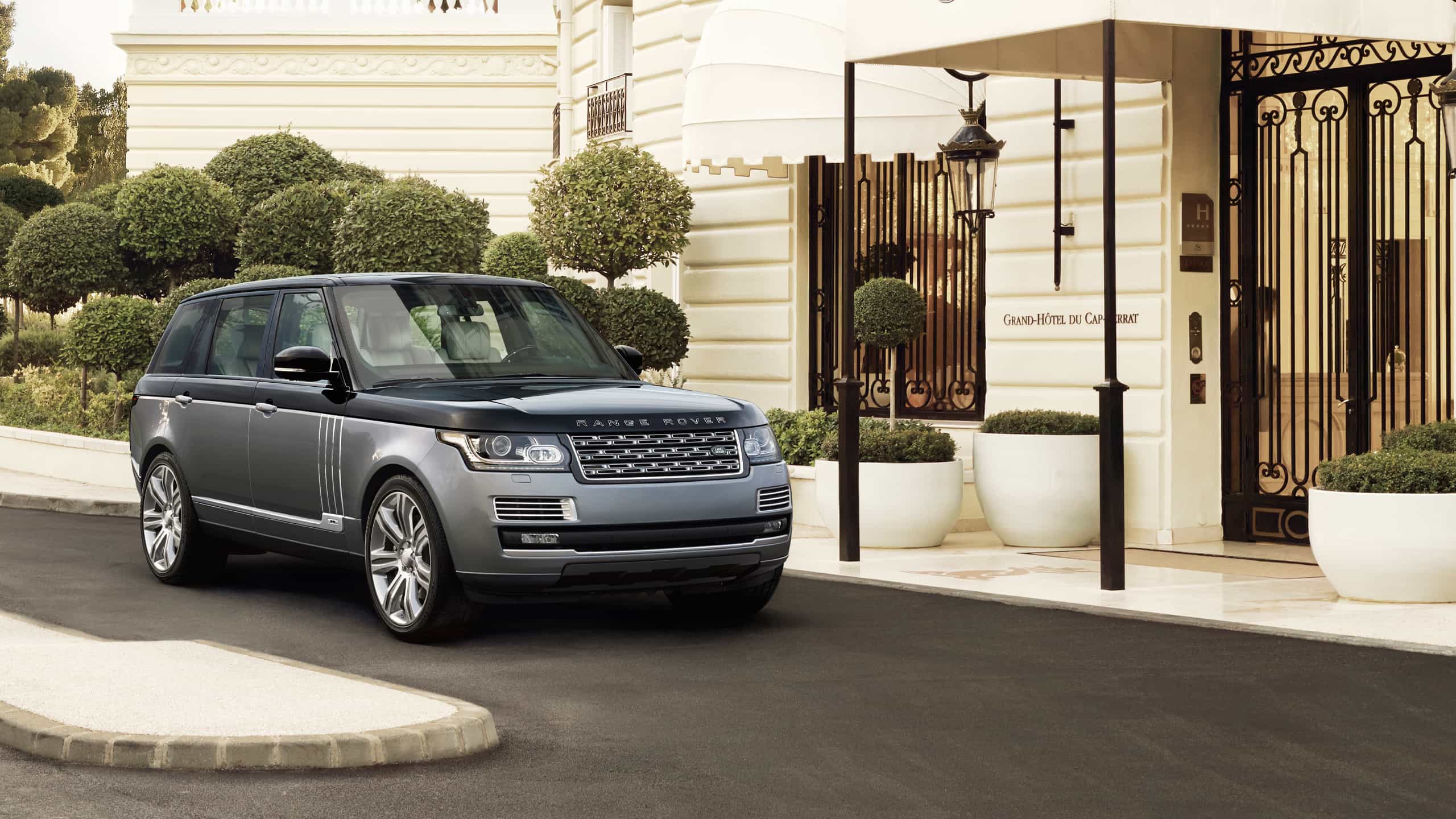 Parked Range Rover In front of villa entrance gate
